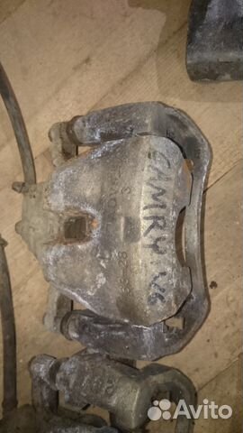 Суппорт томозной Toyota Camry 40