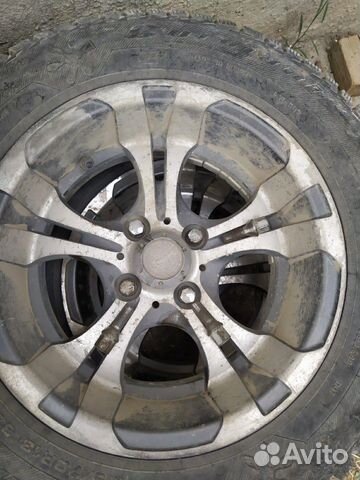 Титановые диски с зимней шипованой резиной Титановые диски с зимней шипованой резиной