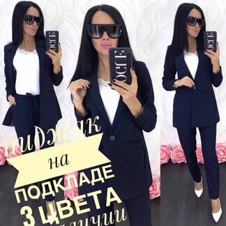 Костюм брючный новый темно-синего цвета