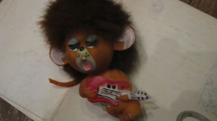 Львенок- музыкант на присоске, сувенирная игрушка